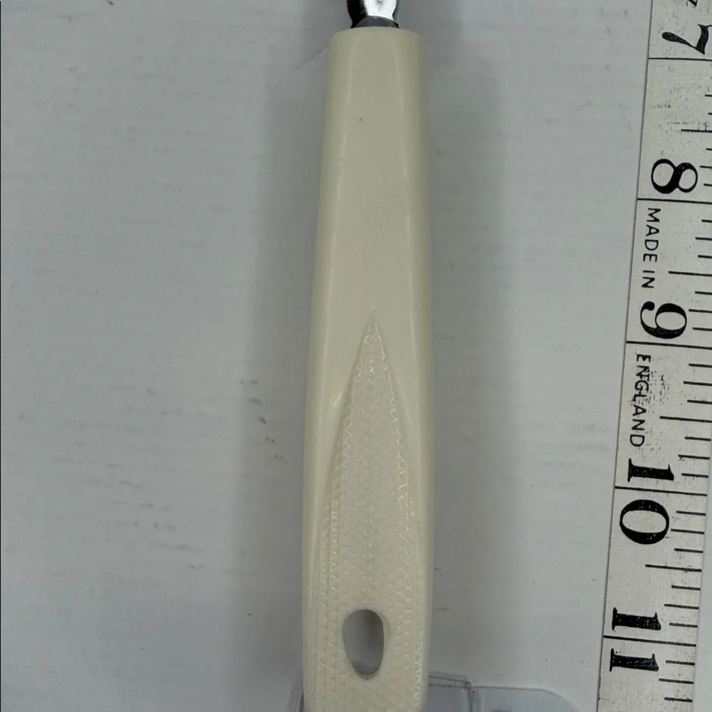 Vintage EKCO Chromium Plated Slotted Spoon with Cream Handle